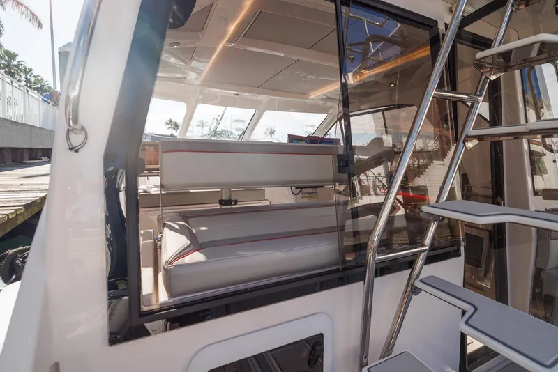 Slide: The Image of Interior view of 2026 Solara S-310 SB yacht with modern seating and sleek design. - 22