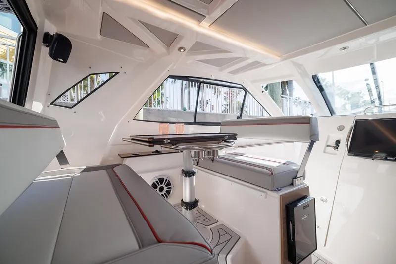 Slide: The Image of Luxurious interior of 2026 Solara S-310 SB boat with modern seating and sleek design. - 30