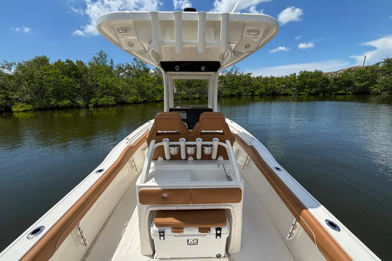 Slide: The Image of 2026 Key West 239 FSR boat on calm water, featuring sleek design and modern amenities. - 7