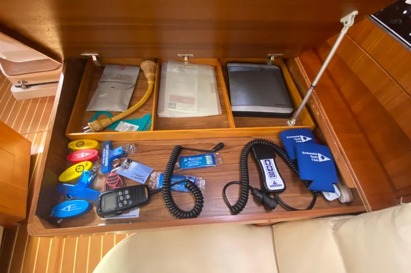 Slide: The Image of Drawer in 2003 Hunter 386 yacht with boating accessories and equipment. - 16