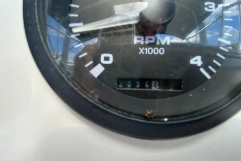 Slide: The Image of Close-up of a 2003 Hunter 386 tachometer showing 2094.4 RPM. - 59