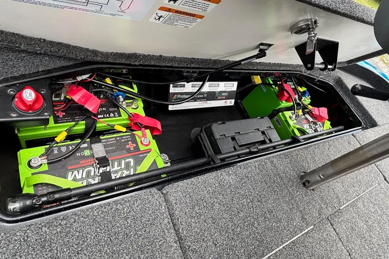 Slide: The Image of 2022 Ranger Z520R Ranger Cup Equipped boat battery compartment with lithium batteries and wiring. - 14