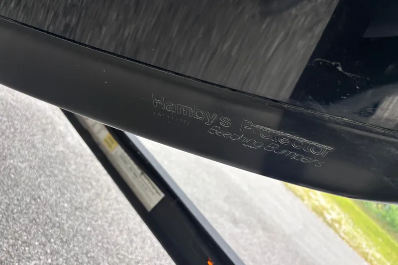 Slide: The Image of Close-up of Hamby's Protector beeching bumper on 2022 Ranger Z520R Cup Equipped boat. - 2