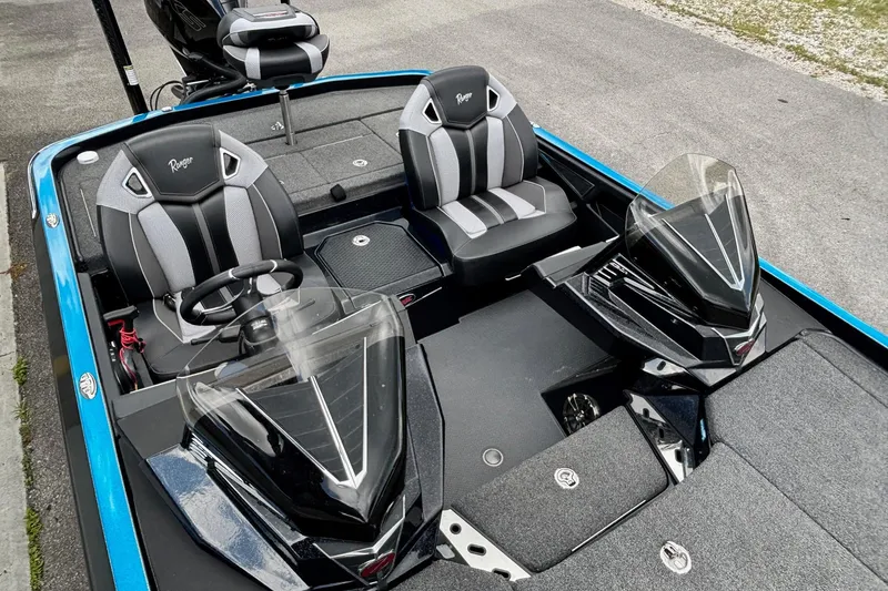 Slide: The Image of 2022 Ranger Z520R Ranger Cup Equipped boat interior with dual seats and steering console. - 8