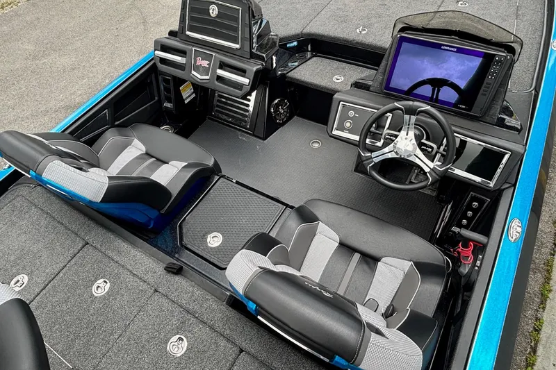 Slide: The Image of 2022 Ranger Z520R Ranger Cup boat interior with modern dashboard and seating. - 9