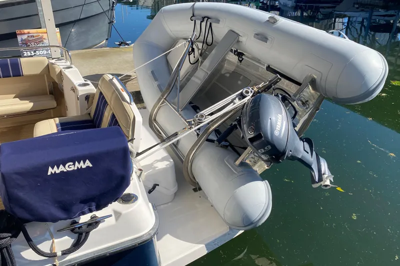 Slide: The Image of 2019 Ranger Tugs R-29 S with inflatable dinghy and Yamaha outboard motor. - 21