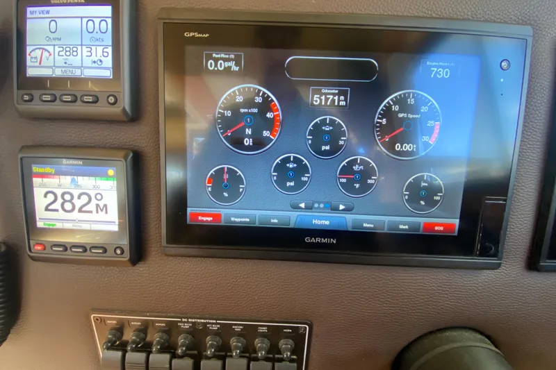 Slide: The Image of Dashboard of a 2019 Ranger Tugs R-29 S with Garmin navigation displays. - 53