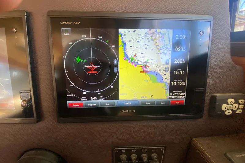 Slide: The Image of Garmin GPS display on 2019 Ranger Tugs R-29 S, showing navigation and radar data. - 54