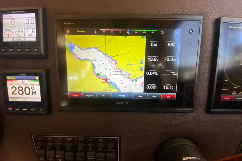 Slide: The Image of Dashboard of a 2019 Ranger Tugs R-29 S with Garmin navigation displays. - 55