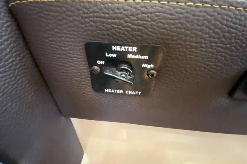 Slide: The Image of Heater control panel in 2019 Ranger Tugs R-29 S boat interior. - 57