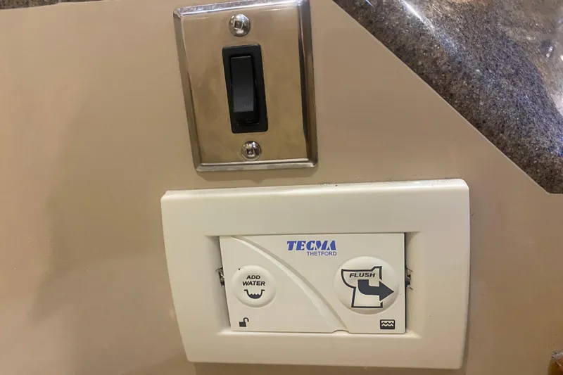 Slide: The Image of Control panel for Tecma Thetford toilet in 2019 Ranger Tugs R-29 S boat. - 68