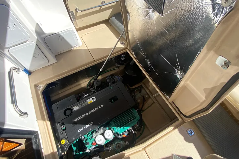 Slide: The Image of Engine compartment of 2019 Ranger Tugs R-29 S with Volvo Penta D4-300 engine. - 75