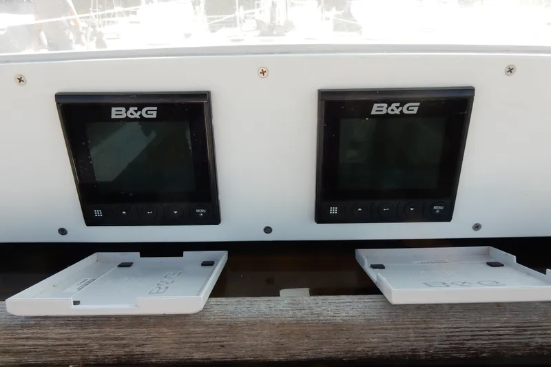 Slide: The Image of B&G navigation displays on a 2011 Hunter 39 sailboat dashboard. - 42
