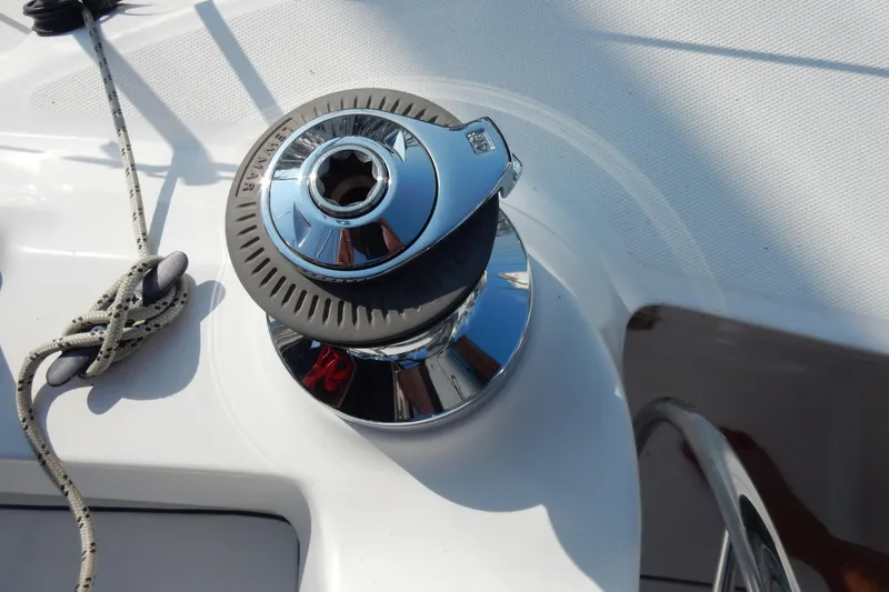 Slide: The Image of Chrome winch on 2011 Hunter 39 sailboat deck with rope detail. - 46