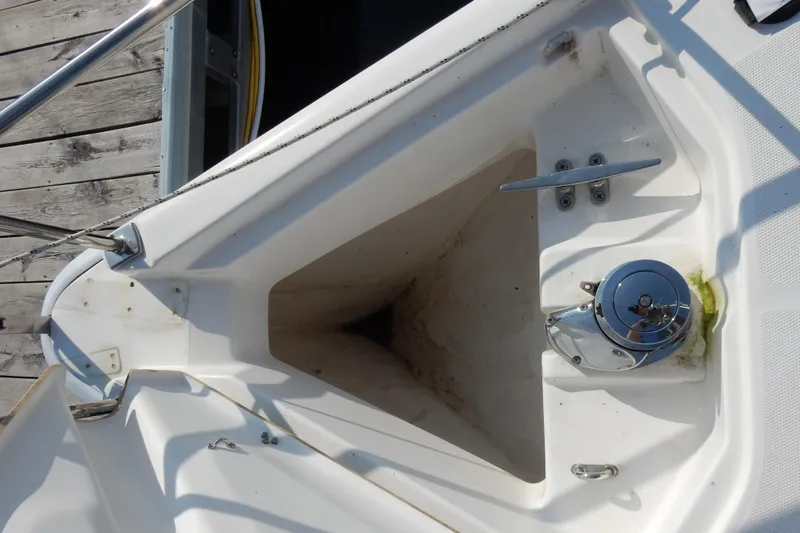 Slide: The Image of Bow of 2011 Hunter 39 sailboat with anchor locker and winch. - 54