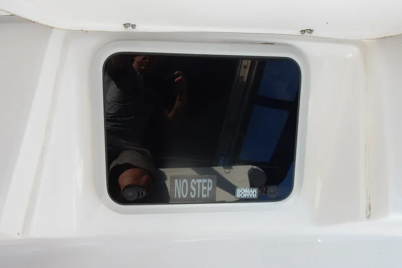 Slide: The Image of Boat hatch with "No Step" warning on a 2011 Hunter 39. - 60