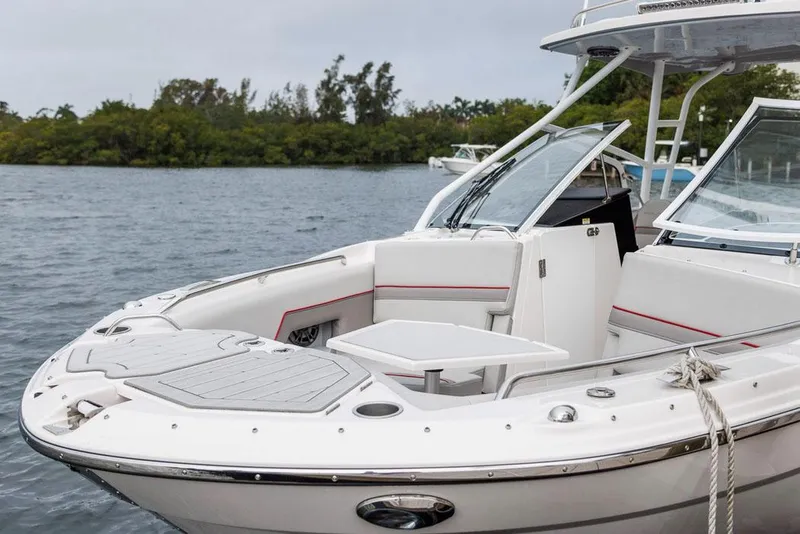 Slide: The Image of Manufacturer Provided Image: 2025 Solara S-250 DC boat on water, featuring sleek design and modern amenities. - 1