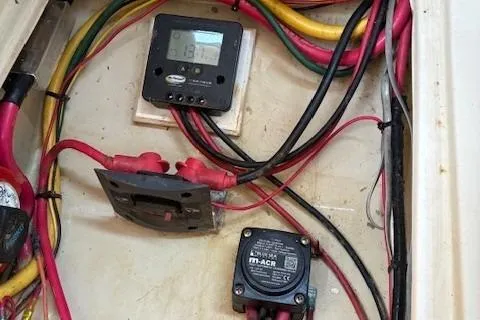 Slide: The Image of Electrical wiring and components inside a 1984 Catalina 38 boat. - 12