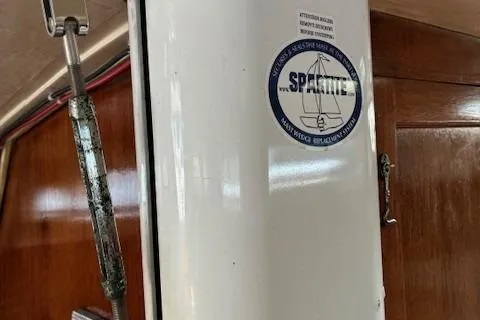 Slide: The Image of 1984 Catalina 38 sailboat interior with Sparlite mast sticker. - 16