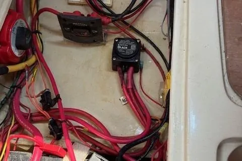 Slide: The Image of Electrical wiring and components inside a 1984 Catalina 38 boat. - 21