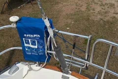 Slide: The Image of 1984 Catalina 38 sailboat with Lifesling safety system on deck railing. - 29