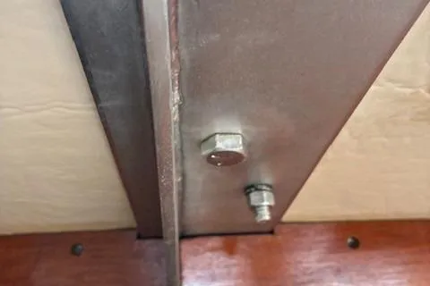 Slide: The Image of Close-up of Catalina 38 (1984) interior bolt and beam structure. - 8