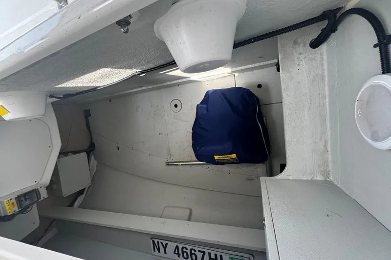 Slide: The Image of Interior of 2020 Beneteau Oceanis 30.1 sailboat with storage compartment. - 8