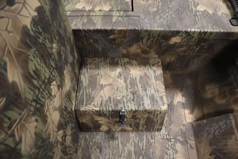 Slide: The Image of Camouflage interior of 2026 Lowe Roughneck RX1860 Pathfinder boat with storage compartment. - 24