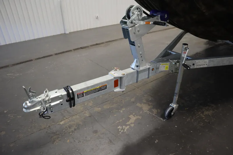 Slide: The Image of Trailer hitch of 2026 Lowe Roughneck RX1860 Pathfinder boat in a garage setting. - 32