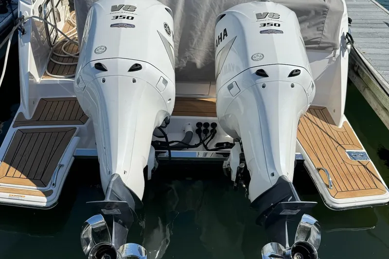 Slide: The Image of 2019 Tiara Sport 34 LX with twin Yamaha V8 350 outboard engines. - 54