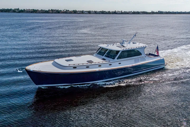 The Image of 2019 Hinckley Talaria 55 MKII Motoryacht cruising on open water, certified pre-owned. - 0