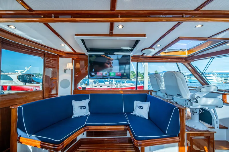 Slide: The Image of Luxurious interior of 2019 Hinckley T55 MKII Motor Yacht with plush seating and modern amenities. - 12