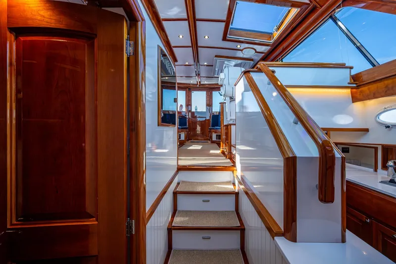 Slide: The Image of Luxurious interior of 2019 Hinckley T55 MKII Motor Yacht with elegant wood finishes. - 20