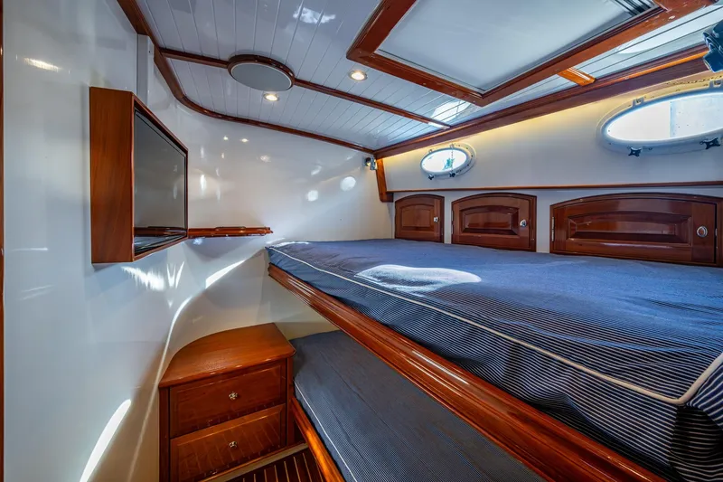 Slide: The Image of Luxurious cabin interior of 2019 Hinckley T55 MKII Motor Yacht with wood accents. - 38