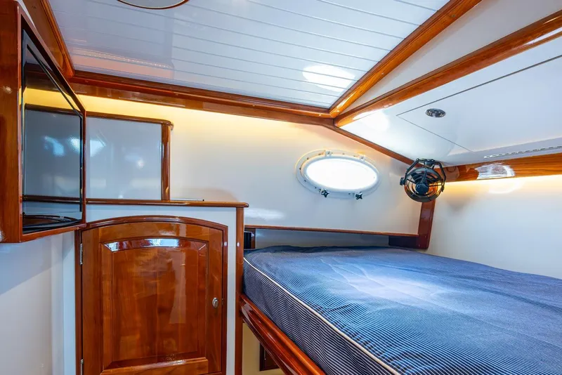 Slide: The Image of Luxurious cabin interior of 2019 Hinckley T55 MKII Motor Yacht with polished wood finish. - 39