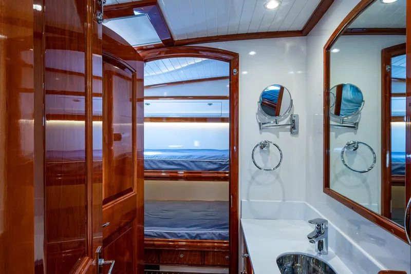 Slide: The Image of Luxurious 2019 Hinckley T55 MKII Motor Yacht interior with elegant wood finish and modern amenities. - 42