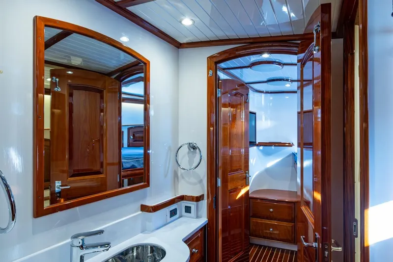 Slide: The Image of Luxurious 2019 Hinckley T55 MKII Motor Yacht interior with elegant wood finishes and modern amenities. - 43