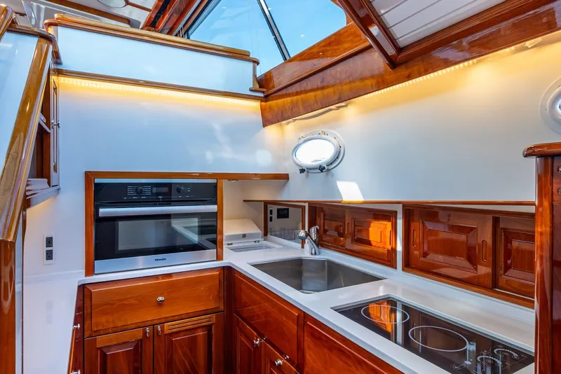 Slide: The Image of Luxurious kitchen interior of 2019 Hinckley T55 MKII Motor Yacht with modern appliances. - 23