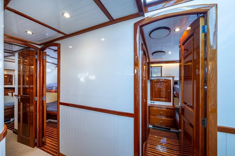 Slide: The Image of Luxurious interior of 2019 Hinckley T55 MKII Motor Yacht with polished wood finishes. - 26
