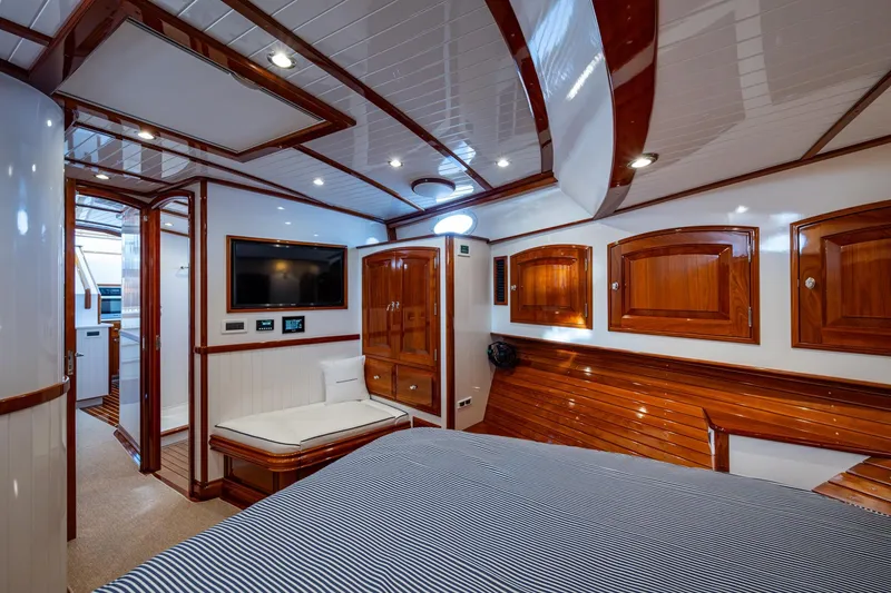 Slide: The Image of Luxurious interior of 2019 Hinckley T55 MKII Motor Yacht with wood finishes and modern amenities. - 31