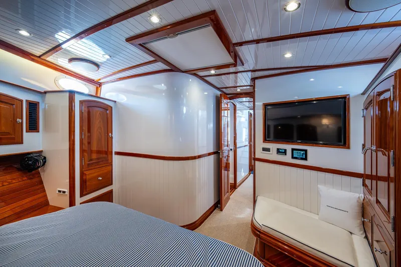 Slide: The Image of Luxurious interior of 2019 Hinckley T55 MKII Motor Yacht with wood accents and modern amenities. - 33