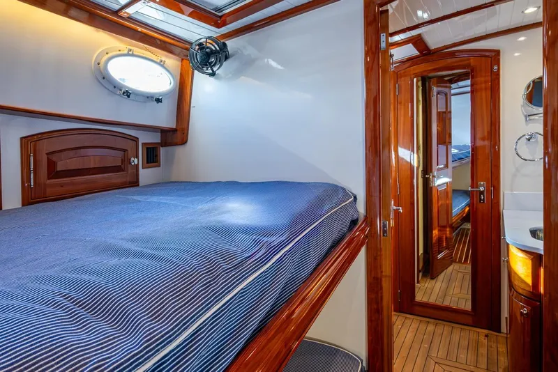 Slide: The Image of Luxurious cabin interior of 2019 Hinckley T55 MKII Motor Yacht with wooden finishes. - 36