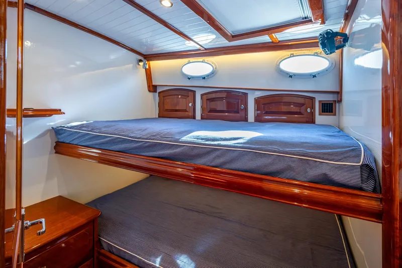Slide: The Image of Luxurious cabin interior of 2019 Hinckley T55 MKII Motor Yacht with wooden finishes. - 37