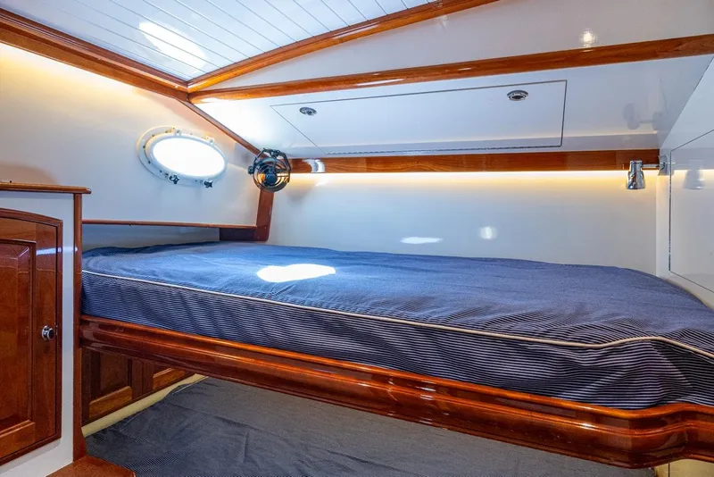 Slide: The Image of Luxurious cabin interior of 2019 Hinckley T55 MKII Motor Yacht with elegant wood finish. - 40