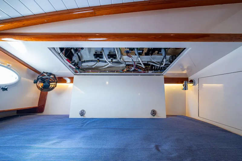 Slide: The Image of Interior view of 2019 Hinckley T55 MKII Motor Yacht showing cabin ceiling and wiring. - 41