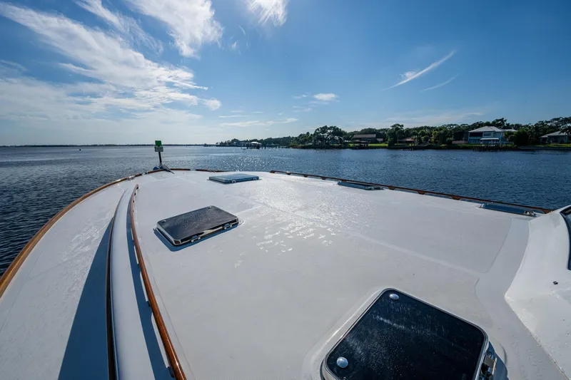 Slide: The Image of 2019 Hinckley T55 MKII Motor Yacht deck with scenic water view. - 47
