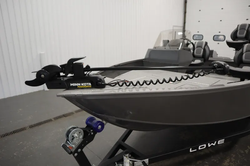 Slide: The Image of Foot pedal control on 2026 Lowe Fishing Machine 1625SC boat deck. - 10