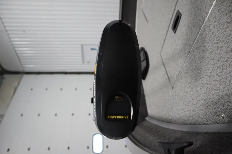 Slide: The Image of 2026 Lowe Fishing Machine 1625SC in a garage, featuring a Mercury 90 engine. - 11