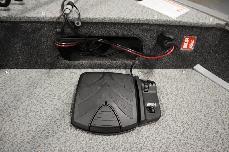 Slide: The Image of 2026 Lowe Fishing Machine 1625SC boat deck with storage compartments and pedal. - 13