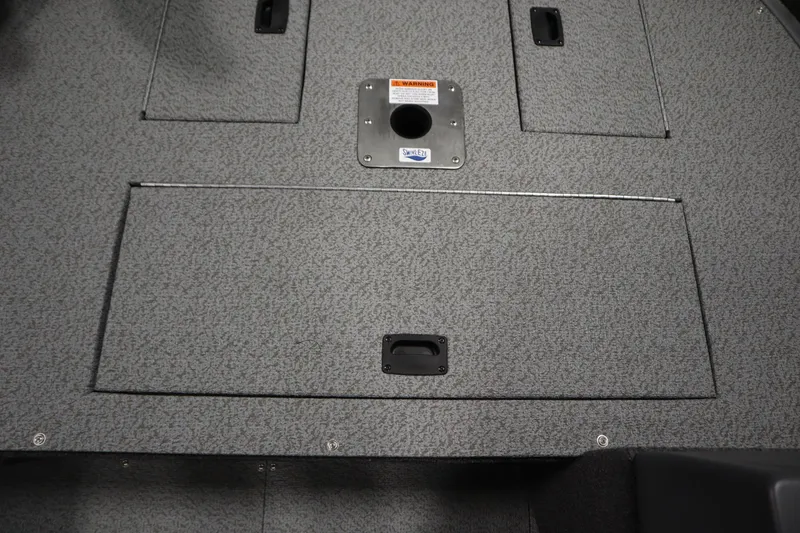 Slide: The Image of 2026 Lowe Fishing Machine 1625SC with Minn Kota PowerDrive trolling motor in showroom. - 16